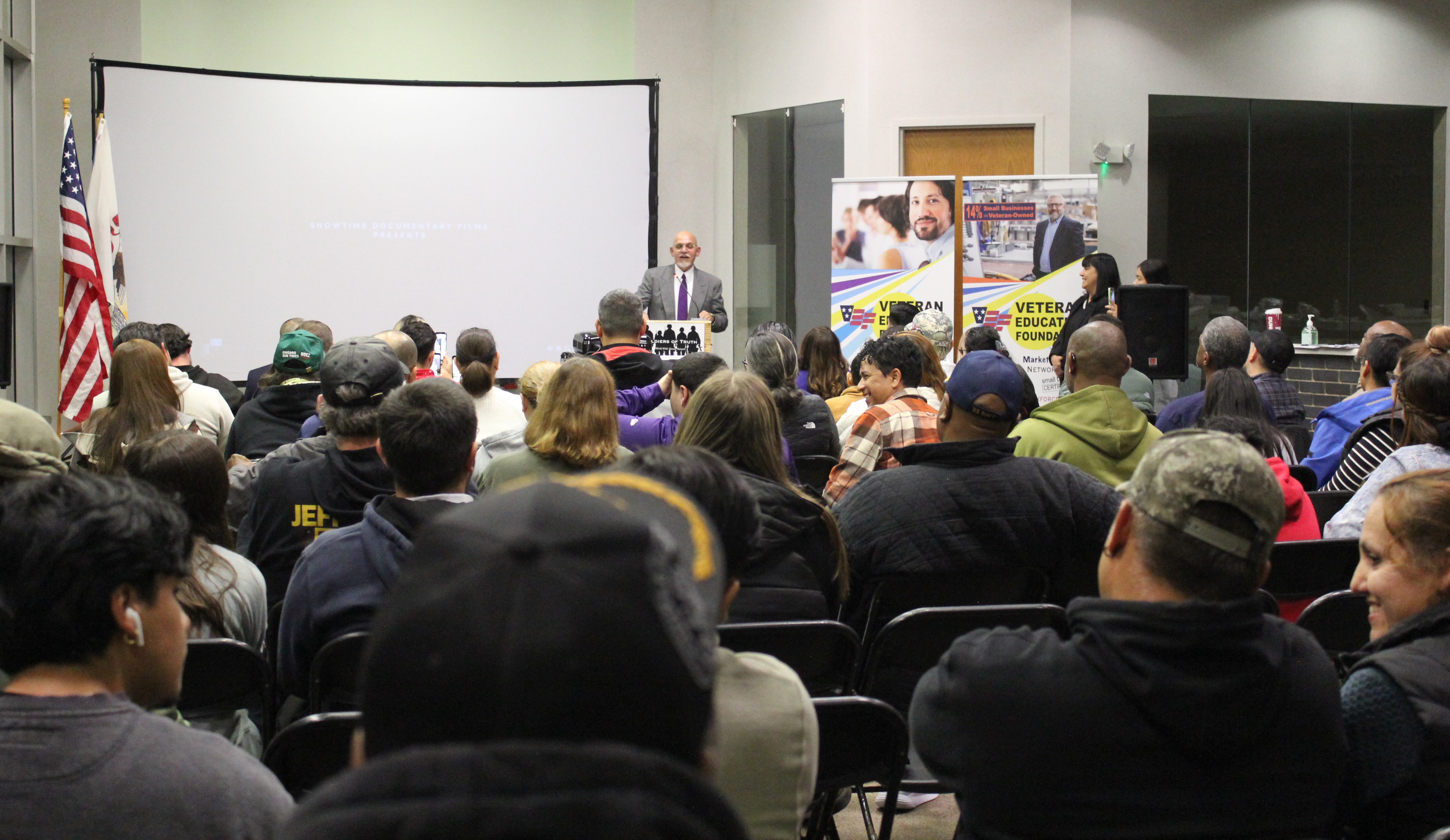 Hector Rodriguez addressing a packed room of veterans and military families, Waukegan, IL, Nov 2024
